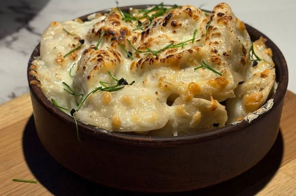 Фото Пельмени из курицы запечённые с сыром